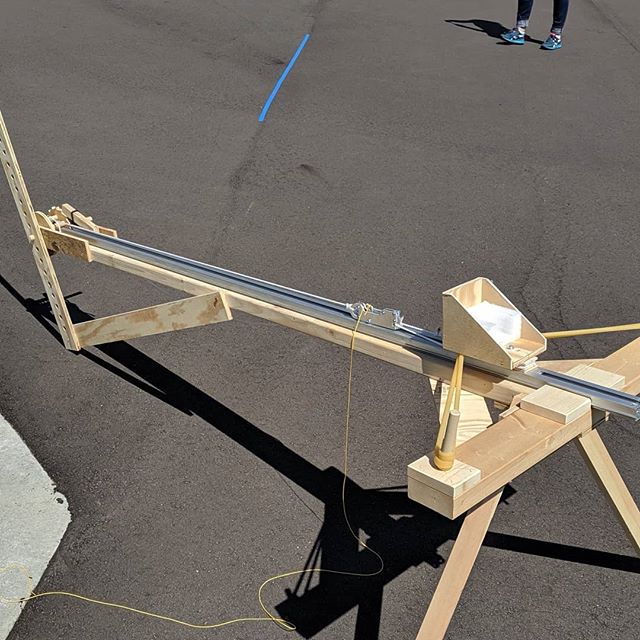 Here's a bit more context for the video I posted here yesterday. For the contest, I had about a week to come up with a weapon for launching tomatoes. It performed OK, but the real fun was building it. All scraps from my garage, the track used to be u