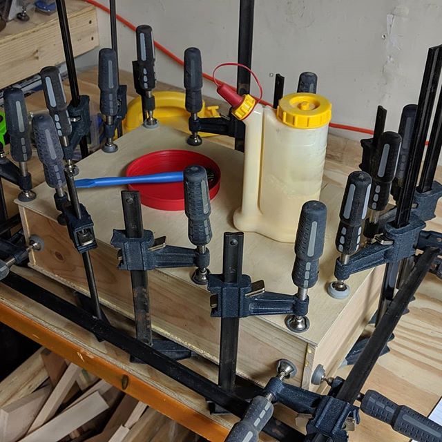Clamp champ! I just finished doing some work on my basement, and now I need some better long-term storage for my new powder nailer and its supplies. Scrap wood to the rescue. Once this box glue-up is dry I'll cut it in half and turn it into a custom 
