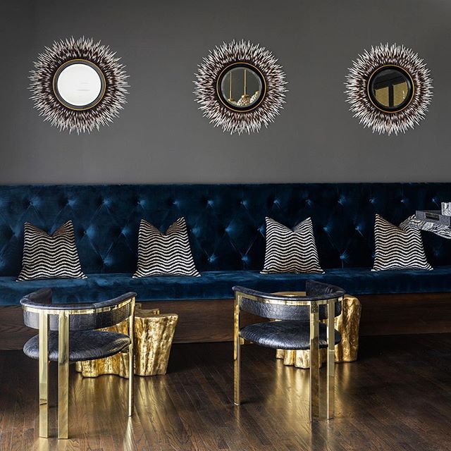 Loving these gold accent chairs in this dark, moody lounge off the bar. I photographed this room using the ambient light from the left window, diffused by the sheer curtains. #gothicglam #goldchairs #velvetlounge #interiordesign #interiorsphotography