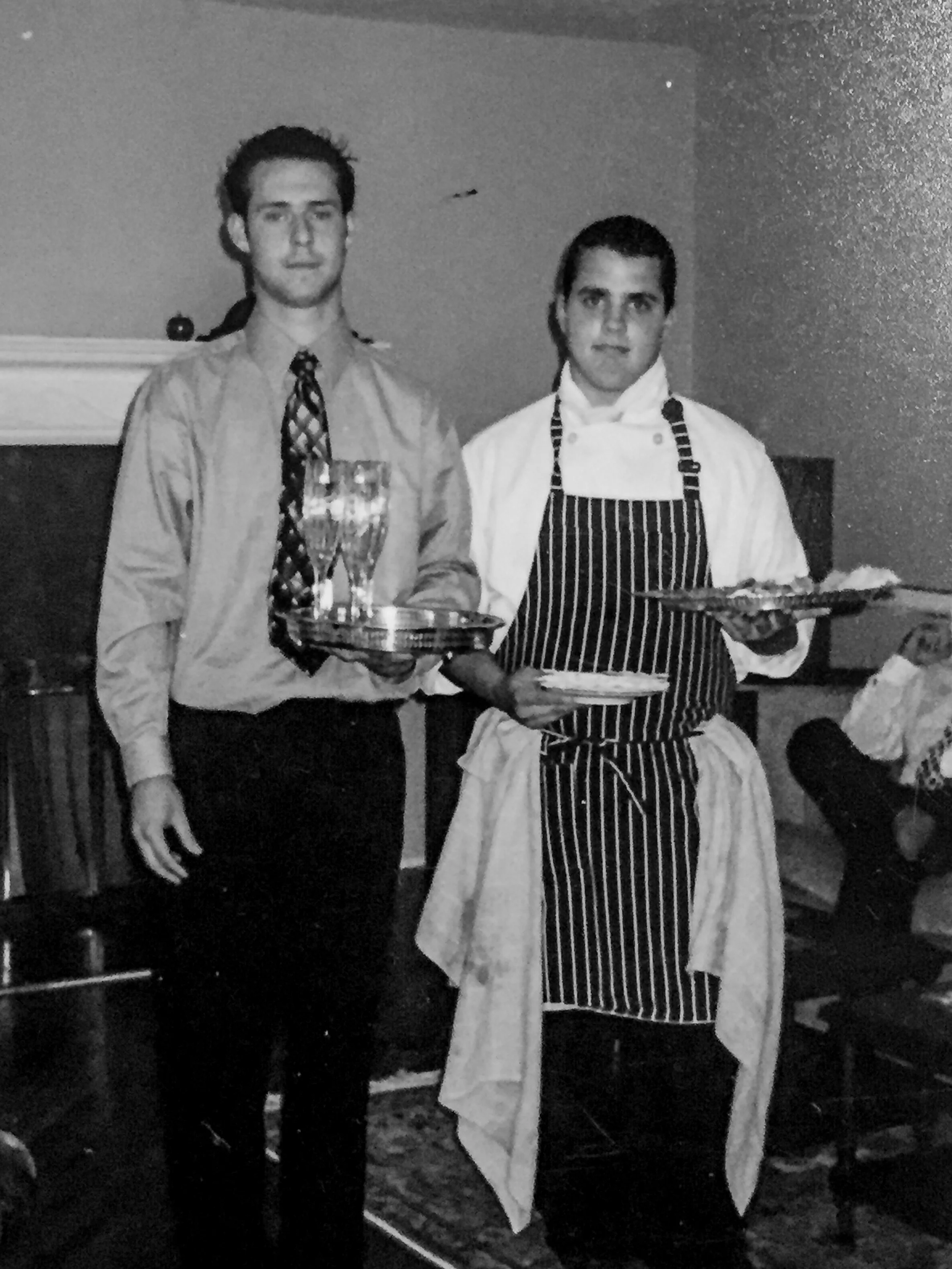 VIC & BRENDAN, N.O.T.L. McNabe Dinner Party c1998 | PHOTO Mom “We always knew how to throw kick-ass dinner parties for the neighbours!” Vic met Brendan growing up in Niagara-on-the-Lake and they have always shared the same passion for “Tasty & f*#kn delicious!” food and hospitality. Together they have over 40 years experience in the restaurant industry and PIANO PIANO is the first time they will have re-united after their famous McNabe dinner parties. They always joked that one day they would work together again and throw dinner parties every night and now they do just that!