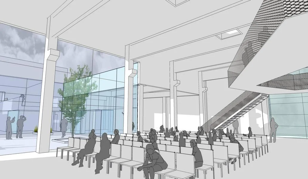  die alte halle bringt seminarräume und einen grossen veranstaltungssaal unter. eine neue, grosszügige verglasung in den hof schafft  transparenz und blickbeziehungen  zur neuen werkstatt. 