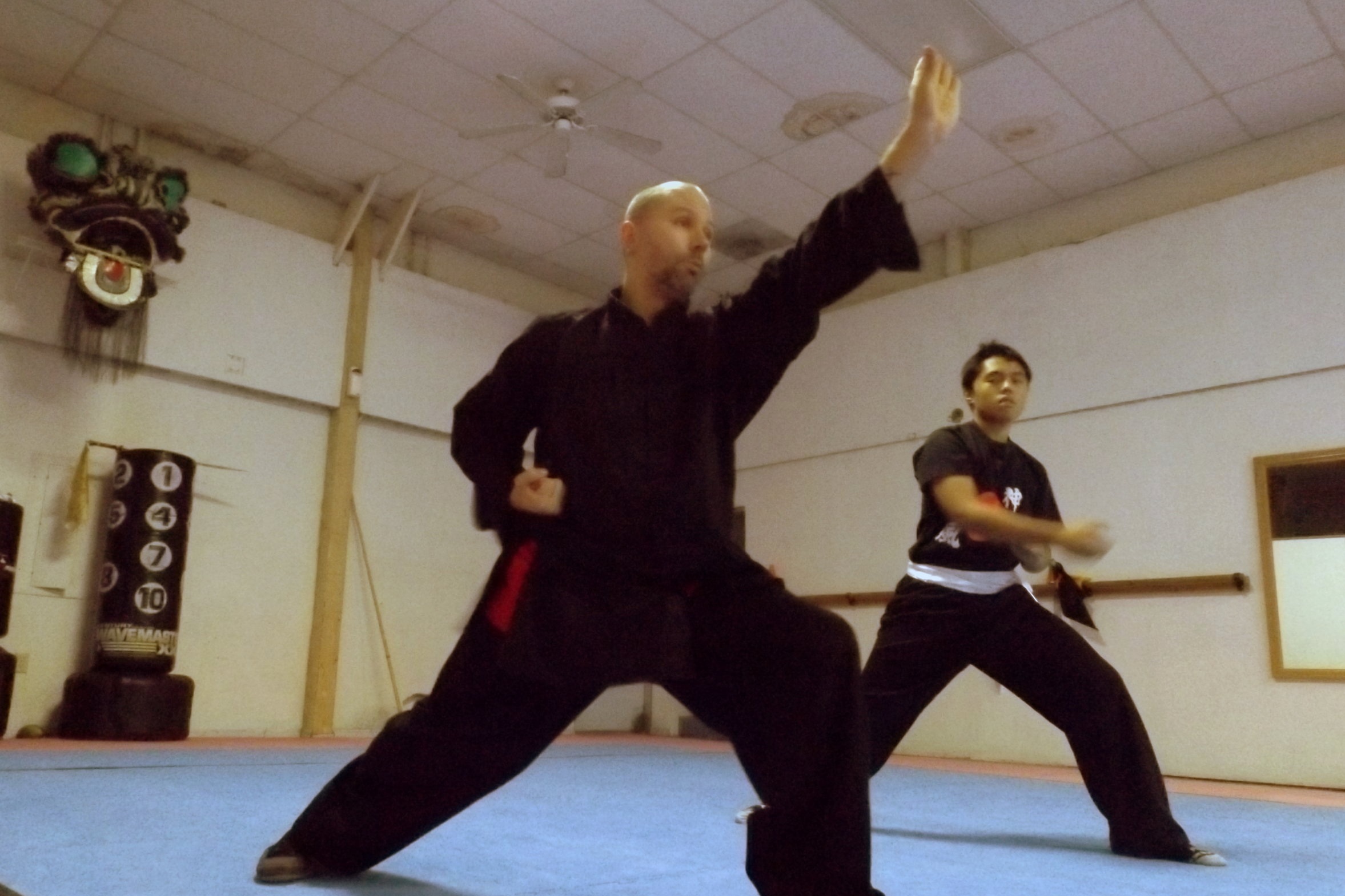 Sifu Norm has been studying traditional Kung Fu for over 18 years within the Shaolin Kung Fu system he teaches. His passion and primary focus is on traditional mind and body conditioning, stances, empty hand and weapons forms. He emphasizes the artistry of Kung Fu for the benefits it gives the practitioner, however the heart of even the most beautiful Kung Fu movement is rooted in martial application. Sifu Norm has trained under Sifu Mathers, and Sigung Eric Lee as well as others, but it was Sifu Brandon who taught him from beginner to his current second degree black sash level, and title as Sifu.