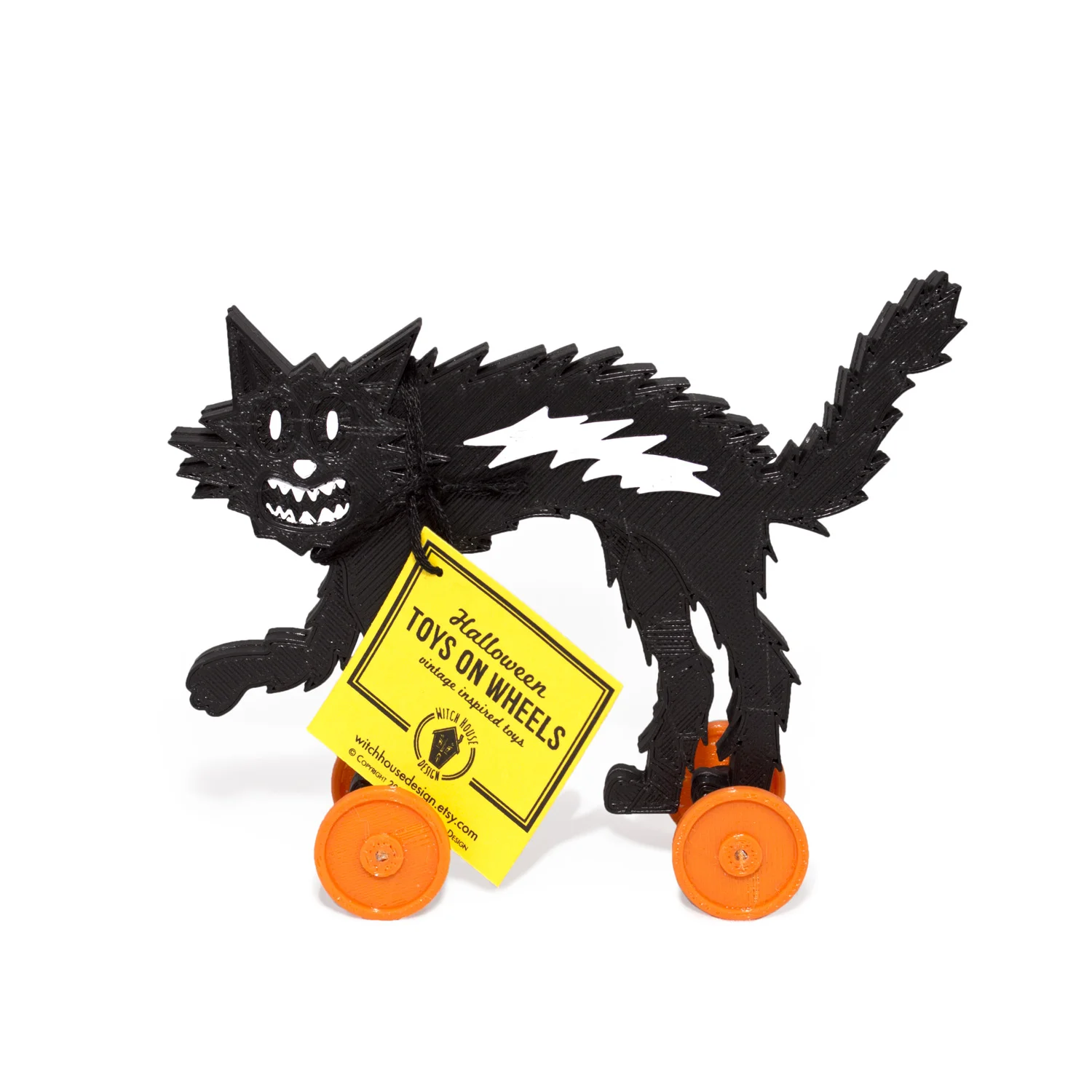 black_cat_w_toys.jpg