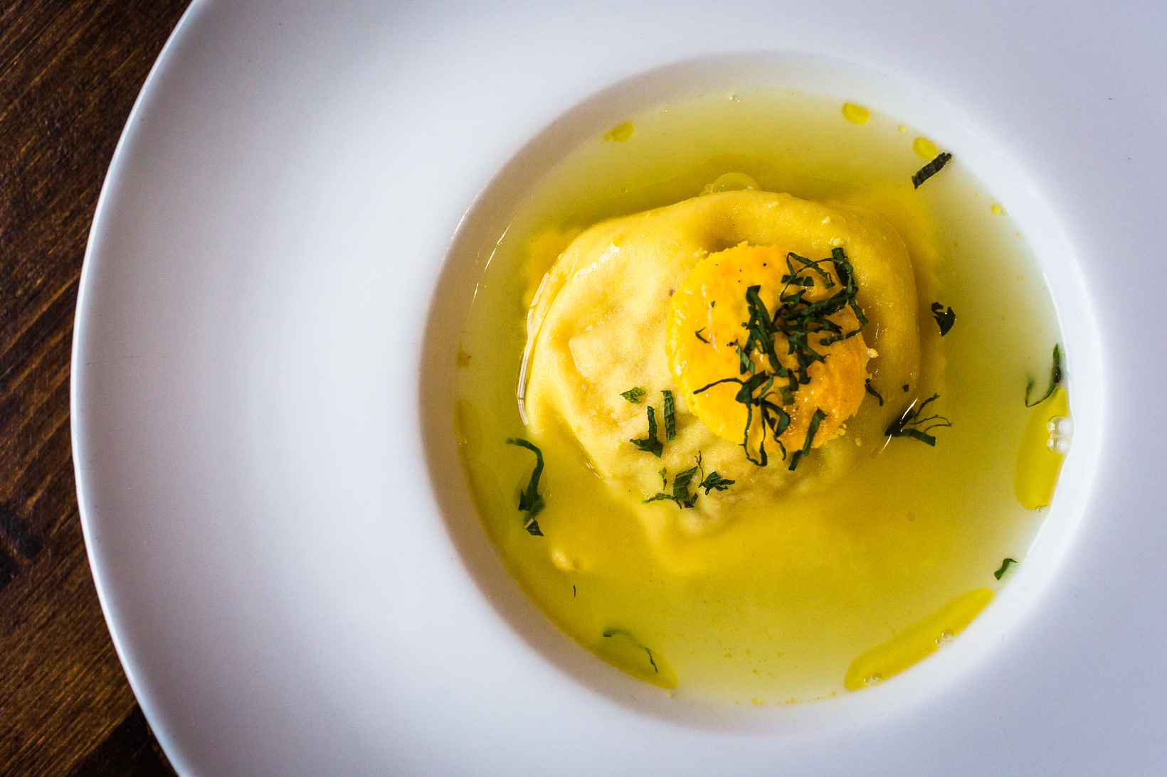  ravioli in broth, soup with ravioli, garnished with egg yolk, Trattoria Moma, modern Italian cuisine, philadelphia 