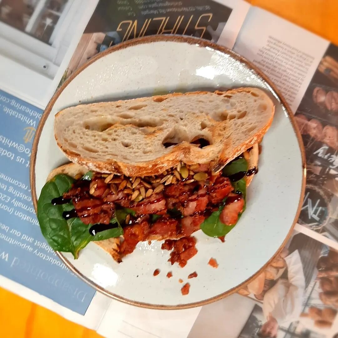 A delicious bacon sarnie from today's service. Crisped bacon lardons, toasted seeds, balsamic glaze and spinach on sourdough.