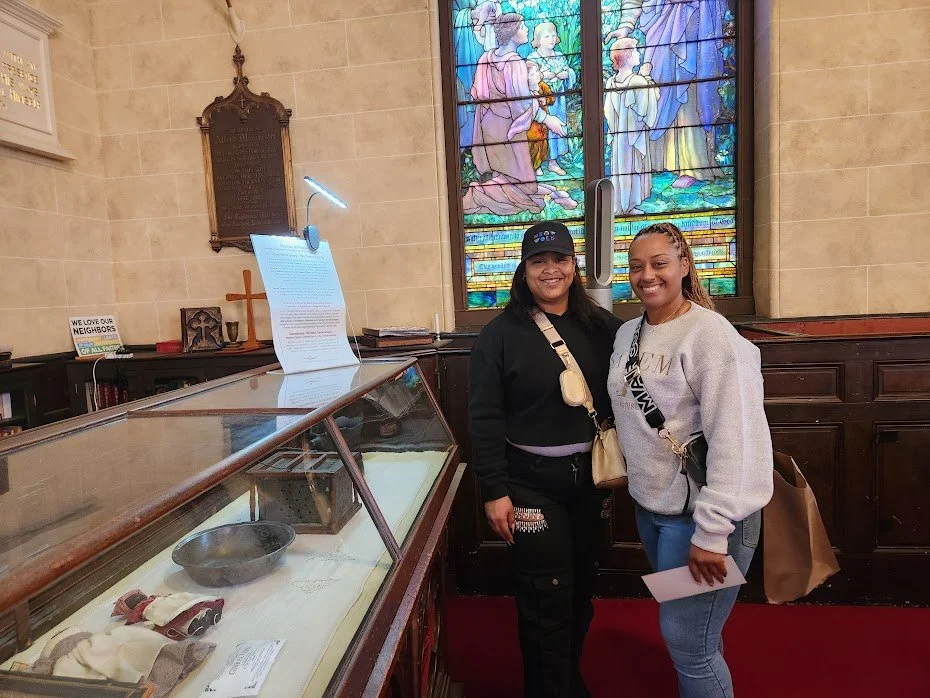 Visitors by display case.jpg
