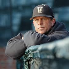 Baseball and the man getting closer