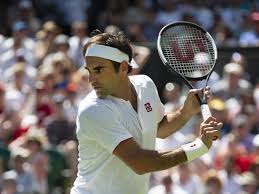 The King of Grass wins in a classic over Rafa (Photo, The Independent).