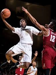 The great Saben Lee leads an exceptional 2018-19 Vanderbilt basketball squad (Photo, The Tennessean). The 2018-19 basketball team Bryce Drew gets ready to send his 2018-19 team to the floor next Tuesday, Nov. 6th at 8:30 PM CT versus Winthrop SEC Network+ will broadcast on the computer. Other key preseason games include a trip to Los Angeles to play USC on Sunday, Nov. 11th at 8 PM CT on the Pac-12 Network. Will have reports on both games. We play in the Miami Hoophall Invitational versus N.C. State Saturday, Dec. 1st at 4 PM CT on ESPN 2. We also host Arizona State on Monday, December 17th at 6 PM CT on the SEC Network. We open SEC play versus Ole Miss at home on Saturday, January 5th at 7:30 PM CT on the SEC Network. We go to Lexington to play Kentucky on Saturday, January 12th at 7:30 PM CT on the SEC Network. Kentucky comes to Memorial on Tuesday, January 29th, at 8 PM CT on ESPN or ESPN2, most likely ESPN. The SEC Tournament is March 13th-17th, a Wednesday through Sunday at Bridgestone Arena in Nashville. Kentucky is loaded as are Auburn, Tennessee, LSU and Mississippi State. Alabama, Arkansas, Florida and South Carolina are all dangerous and talented. Do we have a chance to win the conference and go deep in March? Absolutely. With our freshmen, 5 star 6’10”, 240 pound power forward Simi Shittu, 5 star freshman point guard Darius Garland, high 4 star (97 by 247 sports) small forward Aaron Nesmith (6’6”, 213) along with transfers, 6’10”, 240 pound center Yanni Wetzel from St. Mary’s College in Texas, 6’8”, 209 power forward Matt Ryan from Notre Dame, who is a sharpshooter from deep and a physical presence in the post. They join our super sophomore class led by point guard Saben Lee, who had a terrific freshman season. do everything small forward Maxwell Evans who can fill up the basket and rebound, steal the ball and pass. I’m also looking for big things out of 6’10”, 234 power forward Ejike Obinna. Ejike flashed signs of being a stellar player last year, he just needed to keep learning. Looking for him to break out this season. Returners Joe Toye (6’7”, 210 senior) and Clevon Brown (6’8”, 240 junior) look to have special seasons for us as well. The key to the season is we HAVE to stay healthy. If we do, we can be spectacular.