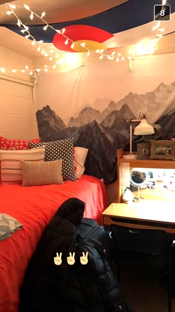 She added her mountain tapestry and Colorado flag to help her remember home.