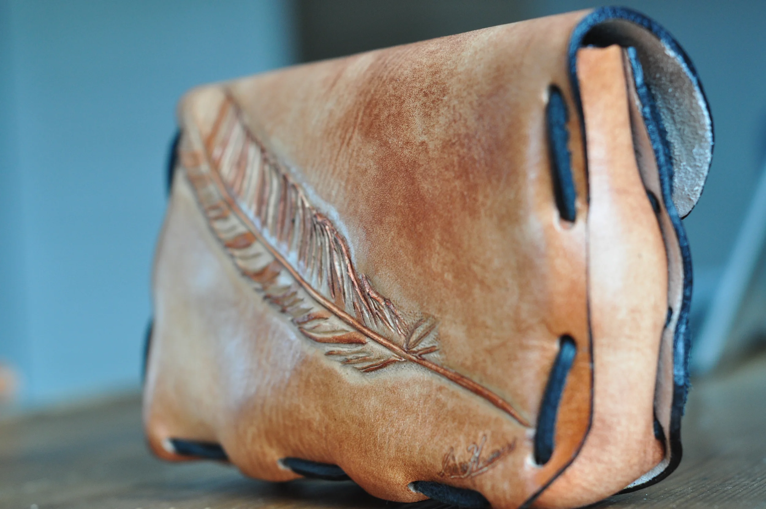 small-leather-clutch-with-tooled-feather-1176.jpg