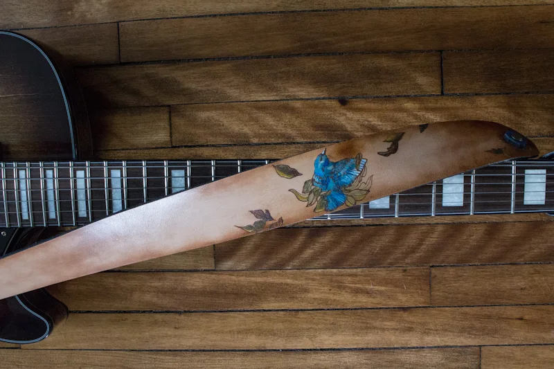 bluebird in my heart that wants to get out guitar strap-3.jpg