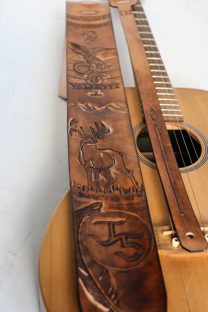 tooled leather guitar strap by Linny Kenney
