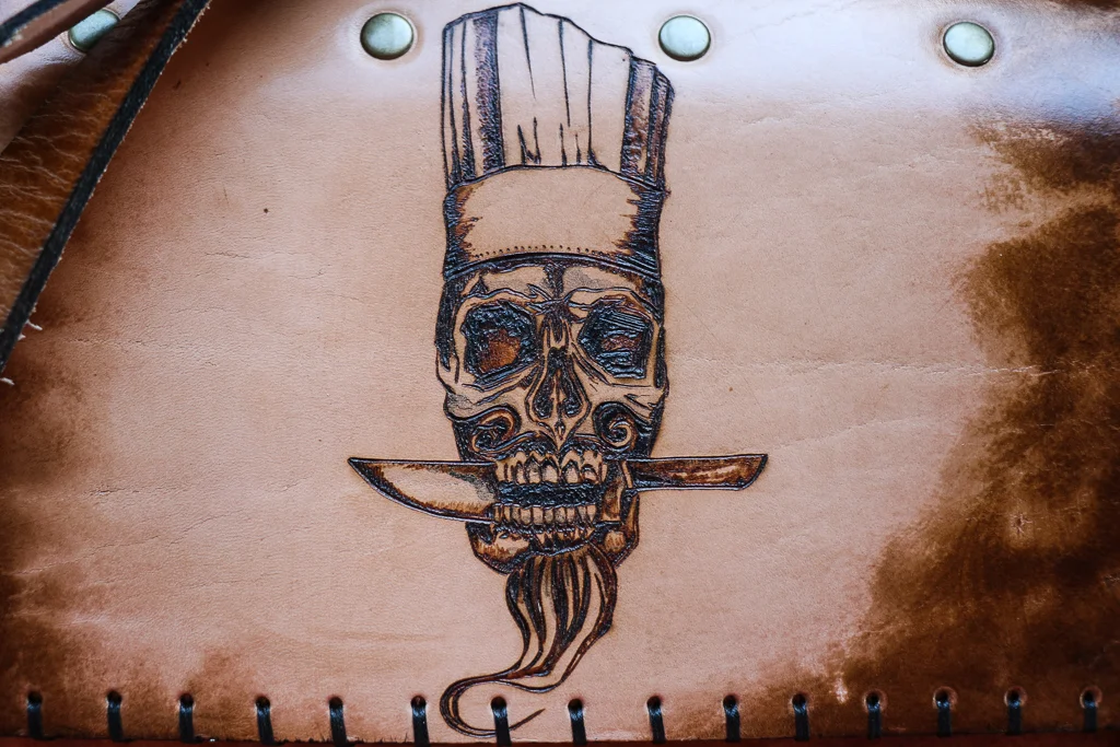 Bearded Skull Leather Knife Roll by Linny Kenney