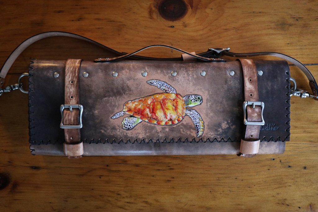 Custom leather knife roll with art by Linny Kenney