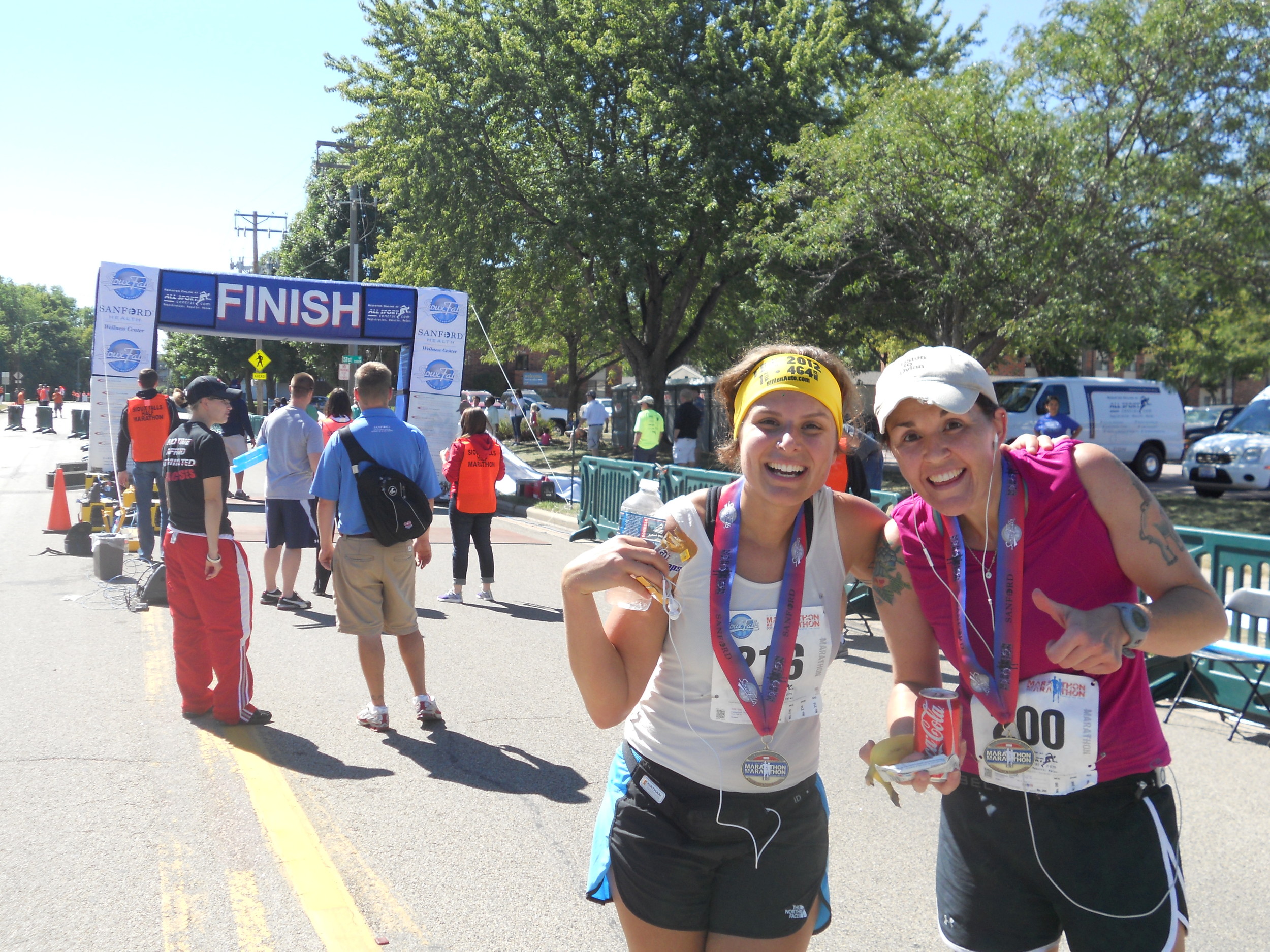 We did it. I hit the finish line with enough sass to tell the announcer just to call me, “Schooly” as he was searching for my name. I got that finisher medal.