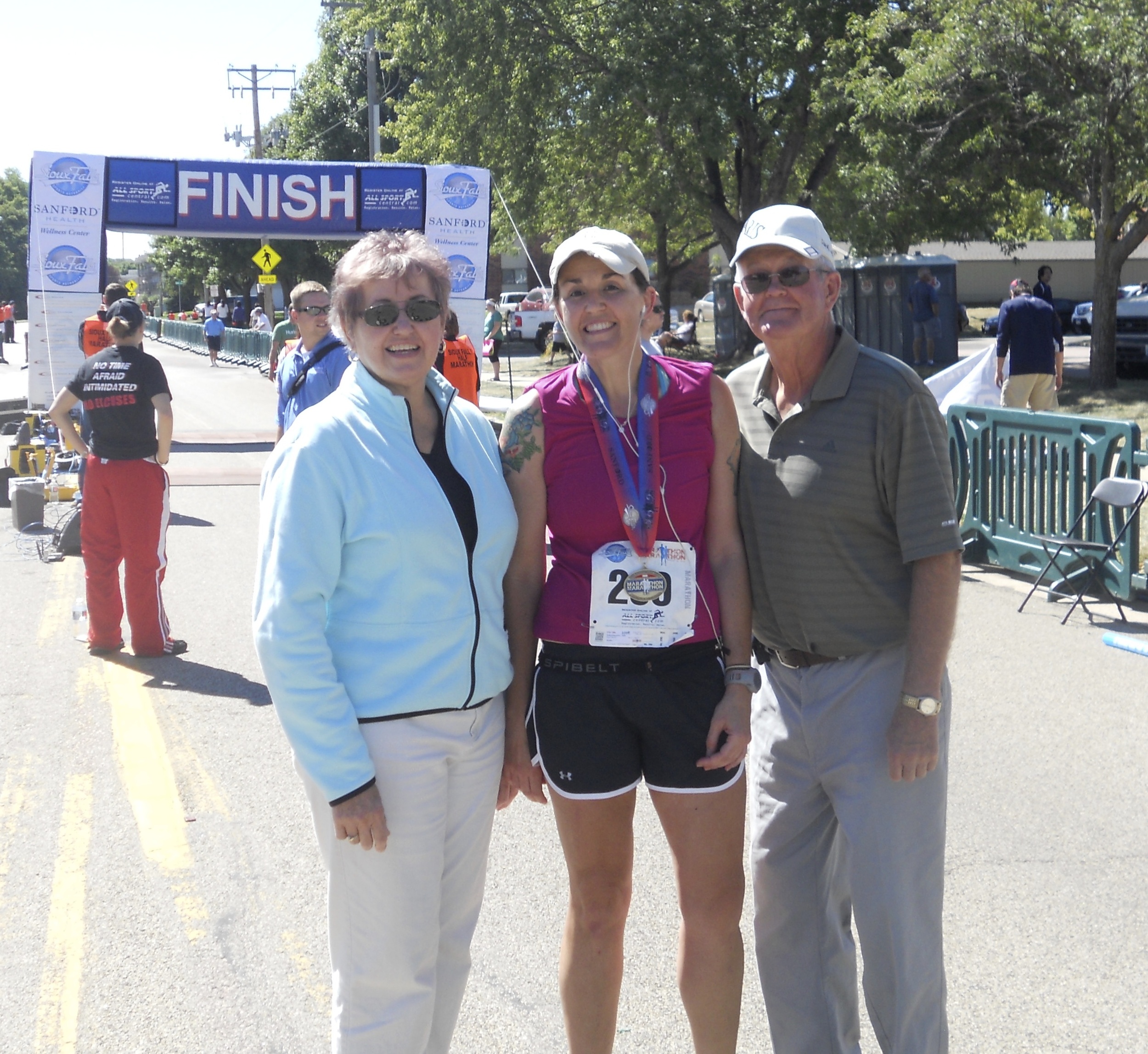 I'm slower than Christmas, but they waited for me at the finish of my first marathon. #biggestfan