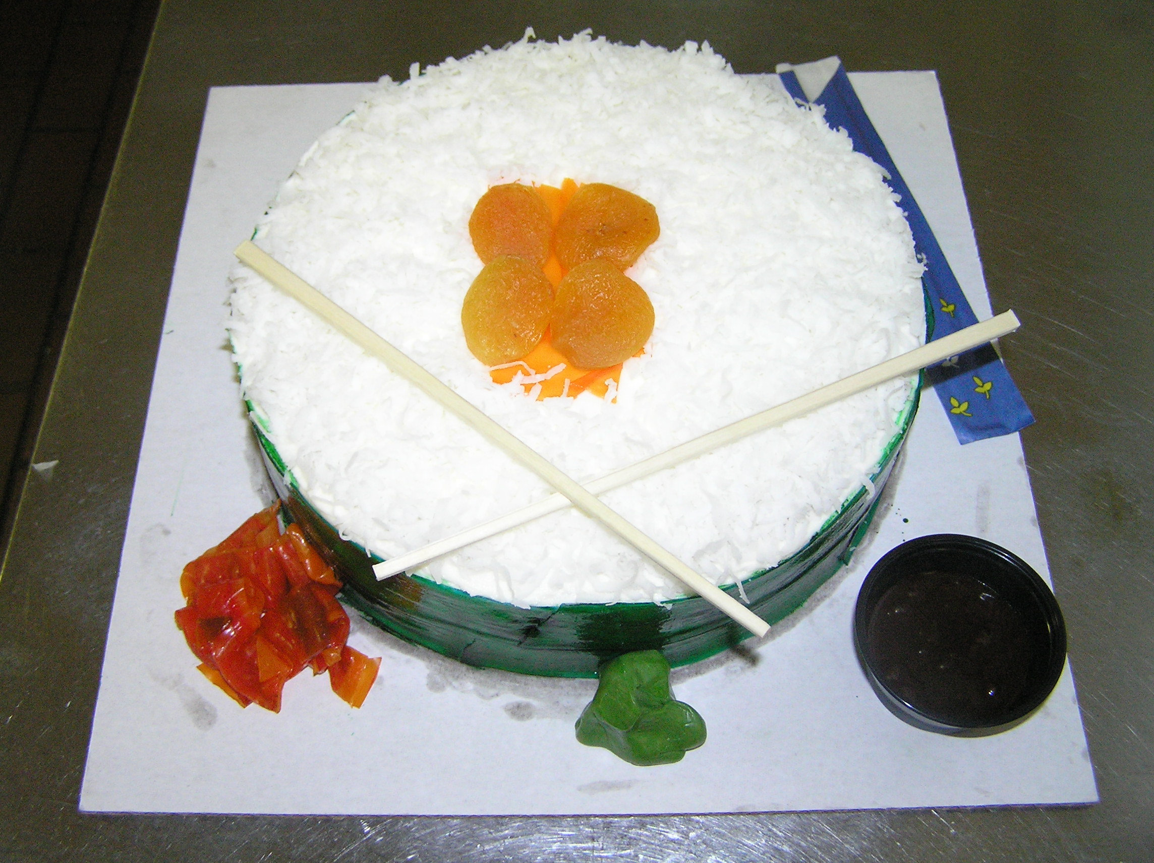 8) Sushi: Fruit roll-up ginger, fondant wasabi, chocolate soy sauce, and coconut rice. 