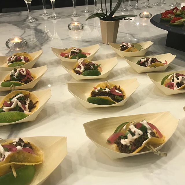 4 chili, pulled pork mini tacos with pickled red onions, chipotle infused creme and cilantro. This was one of four small apps at a fundraiser #spacecowboycatering.com