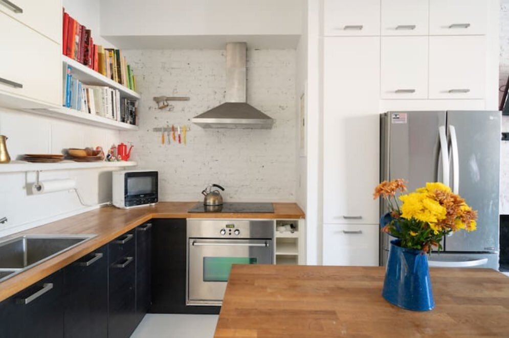 Makeover Monday.  Sometimes the removal of a couple walls can make all the difference.
Www.juliamolloygallagher.com &gt;renovations &gt; parlor loft. #kitchenrenovation #whitefloors #ikeahack