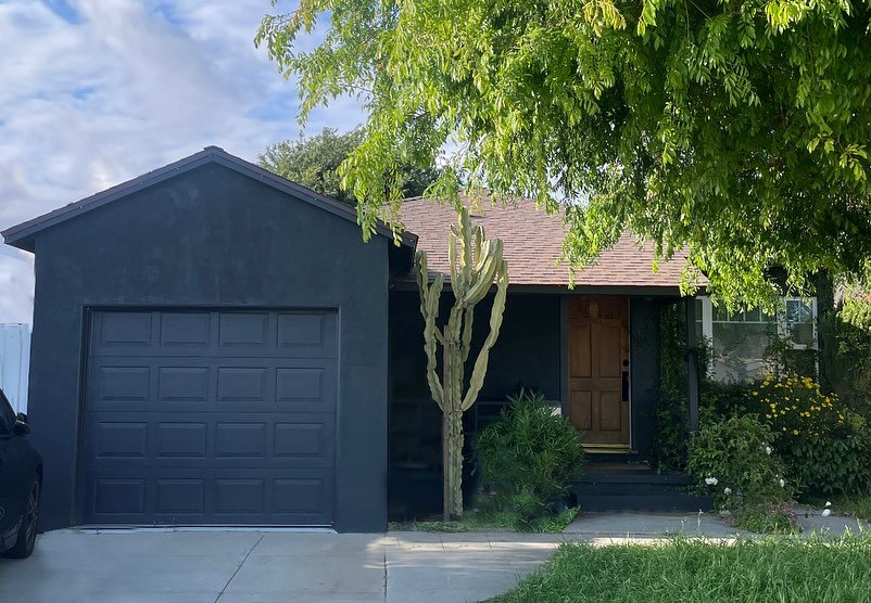 Baby Home: dark paint, light interior, grown over and continues to grow.  We brought the kitchen to the main space raised the ceiling, popped in the skylight and connected the main living area directly to the the backyard.  Creating connection to the