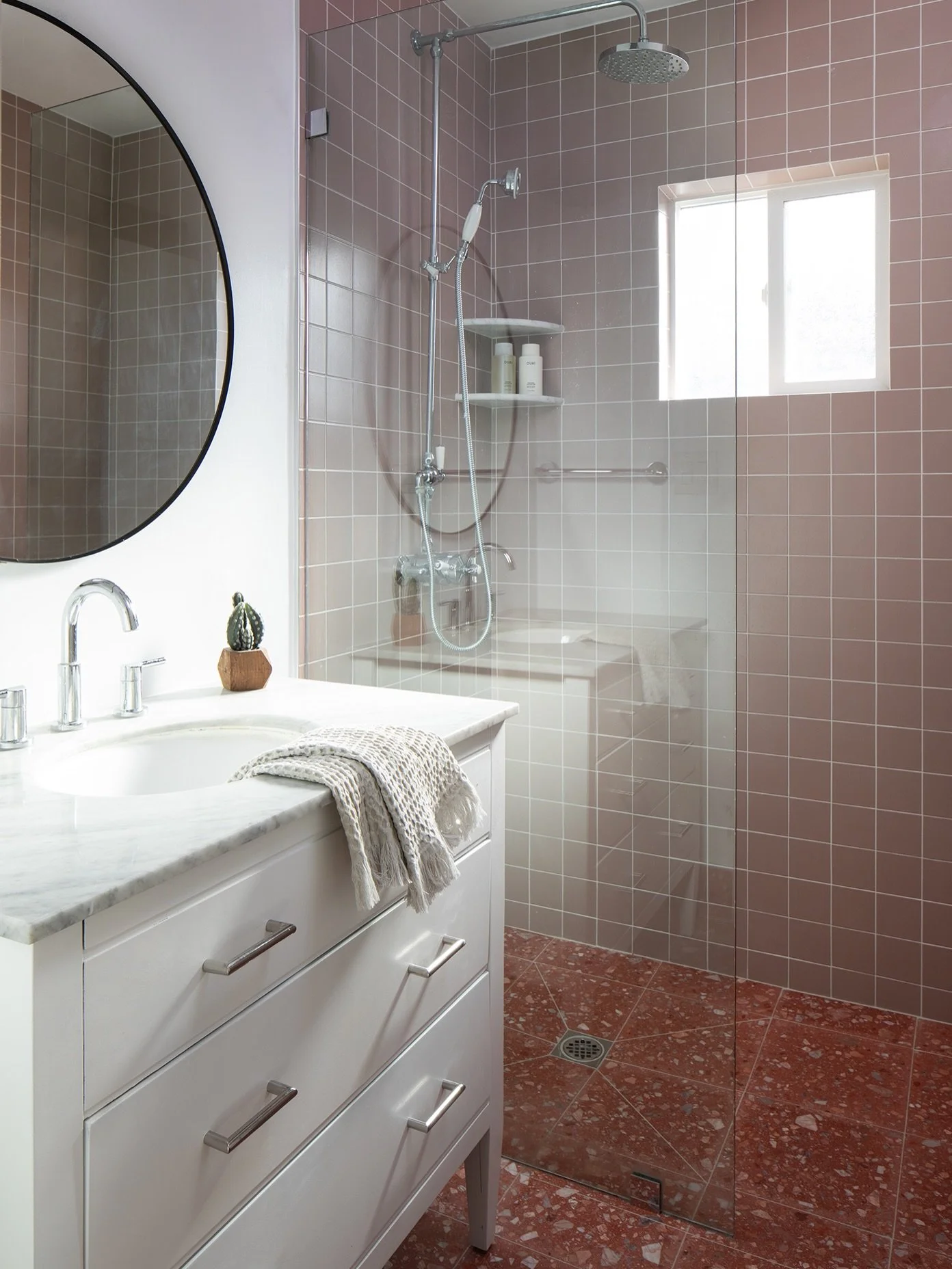 New simple tile from @zia_tile bring a clean palette to this Eagle Rock Move in Refresh.  Harsh patterns from the previous tile are subdued with calming natural terrazzo.  Fresh paint to the existing vanity finishes the look. 📸@meghanbob