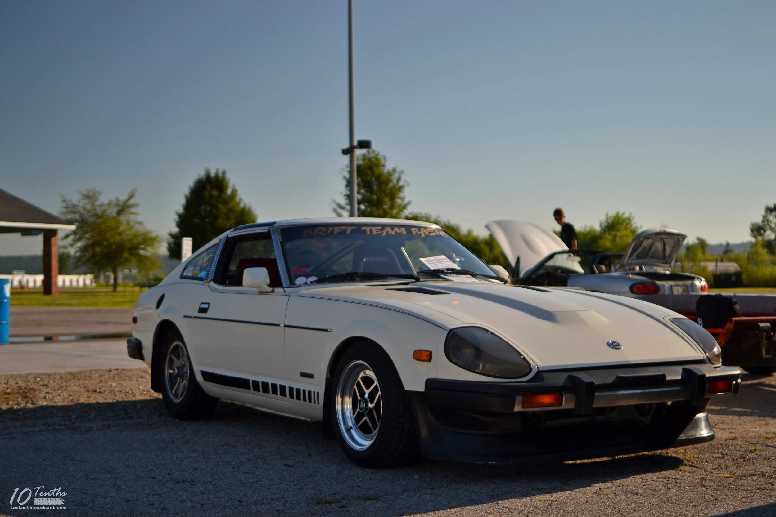 This stunningly gorgeous RB20DET swapped 280z parked next to me in the paddoc
