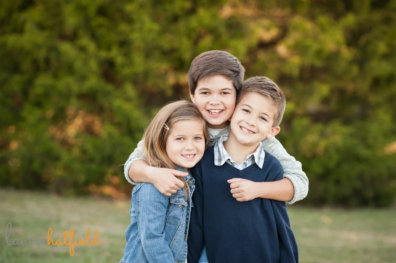 picture of two brothers and one sister