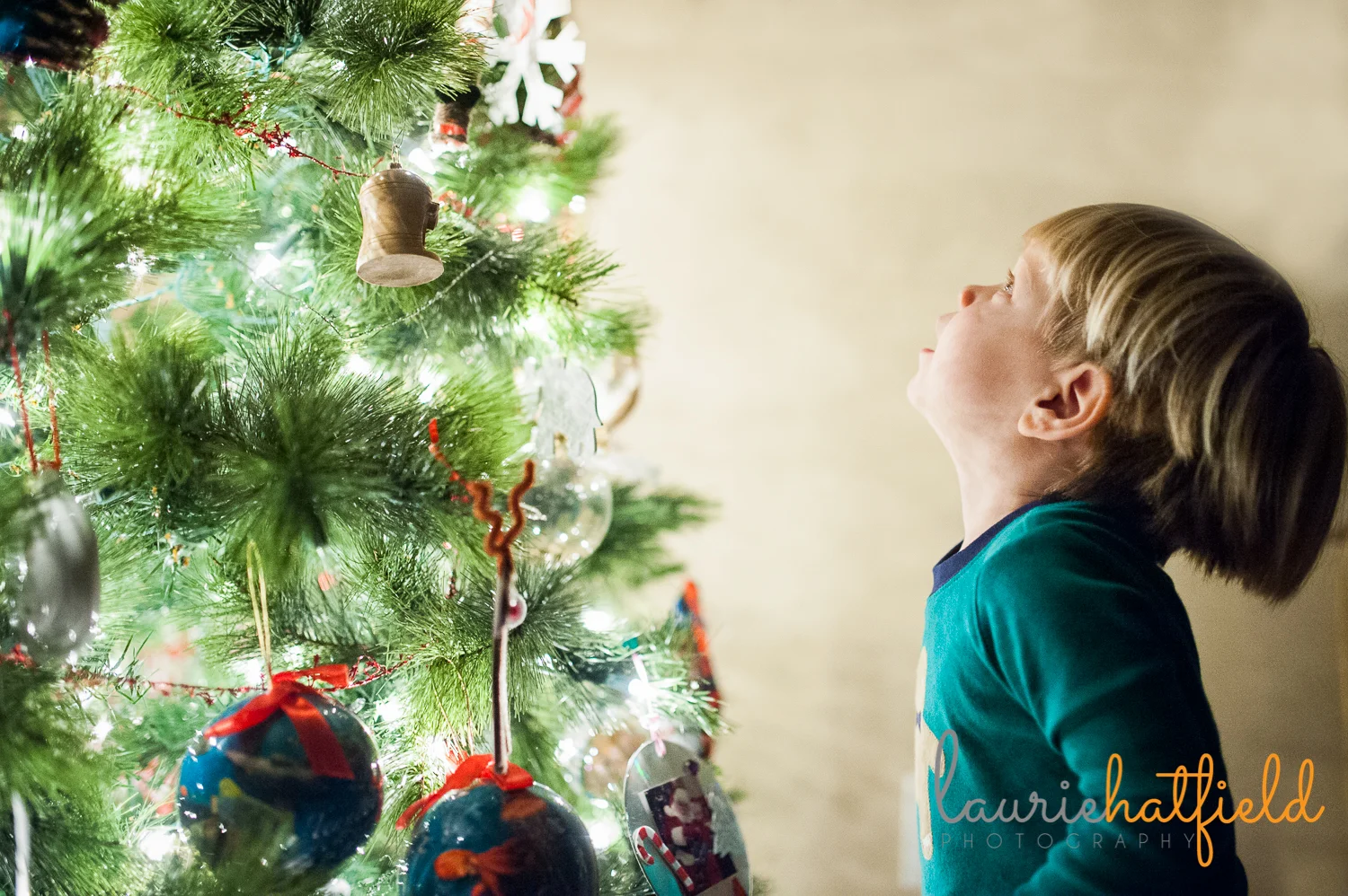 kids by the Christmas tree