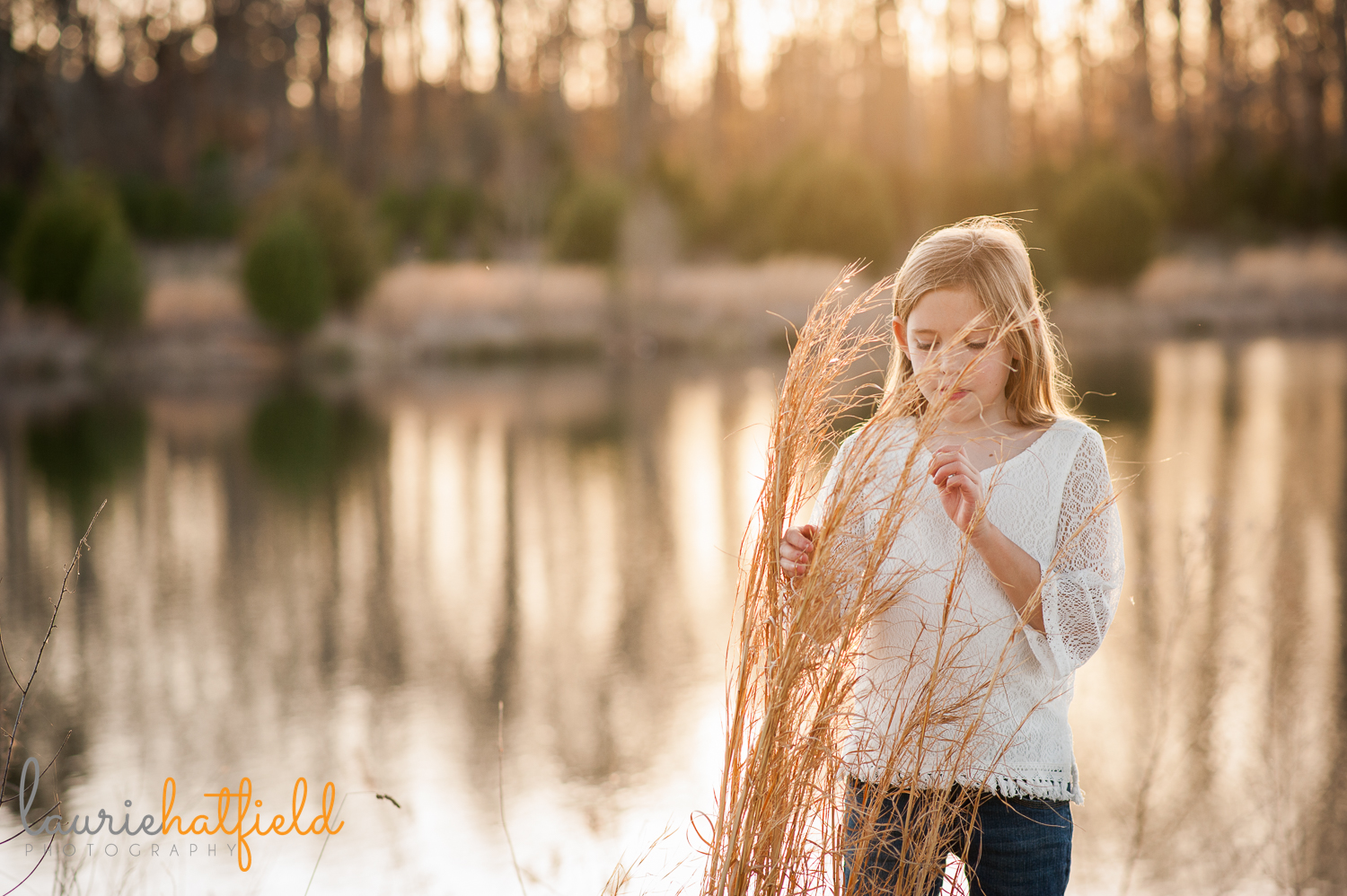 9-year-old girl in tall grass {huntsville photographer}