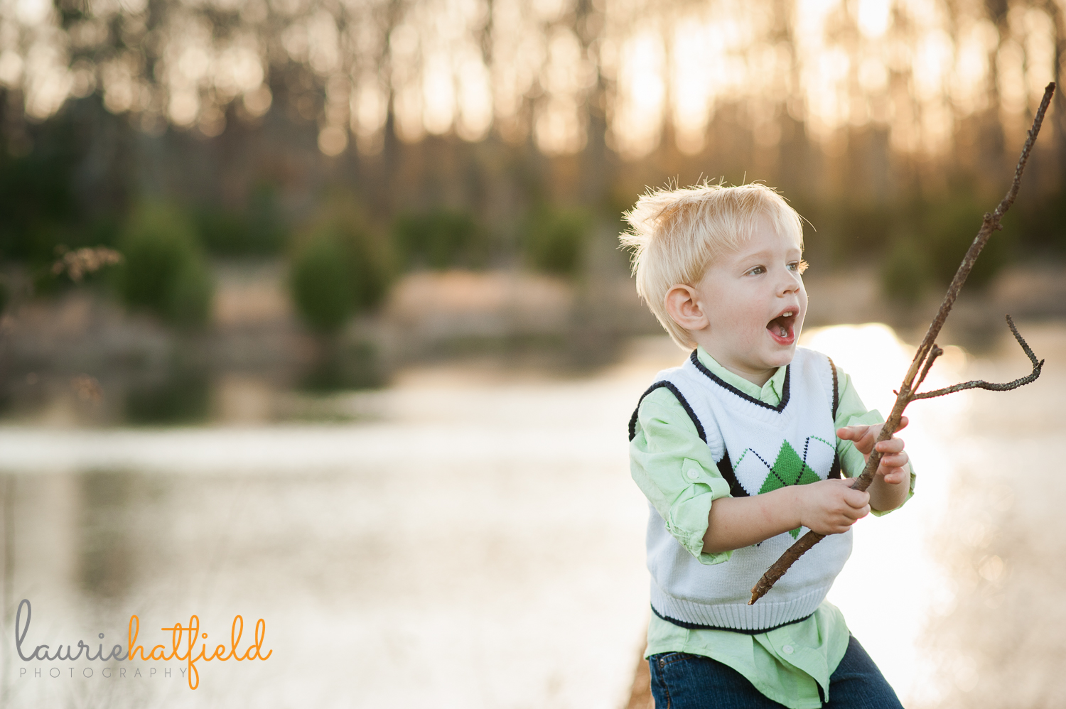 2-year-old boy playing with stick {huntsville al photographer}