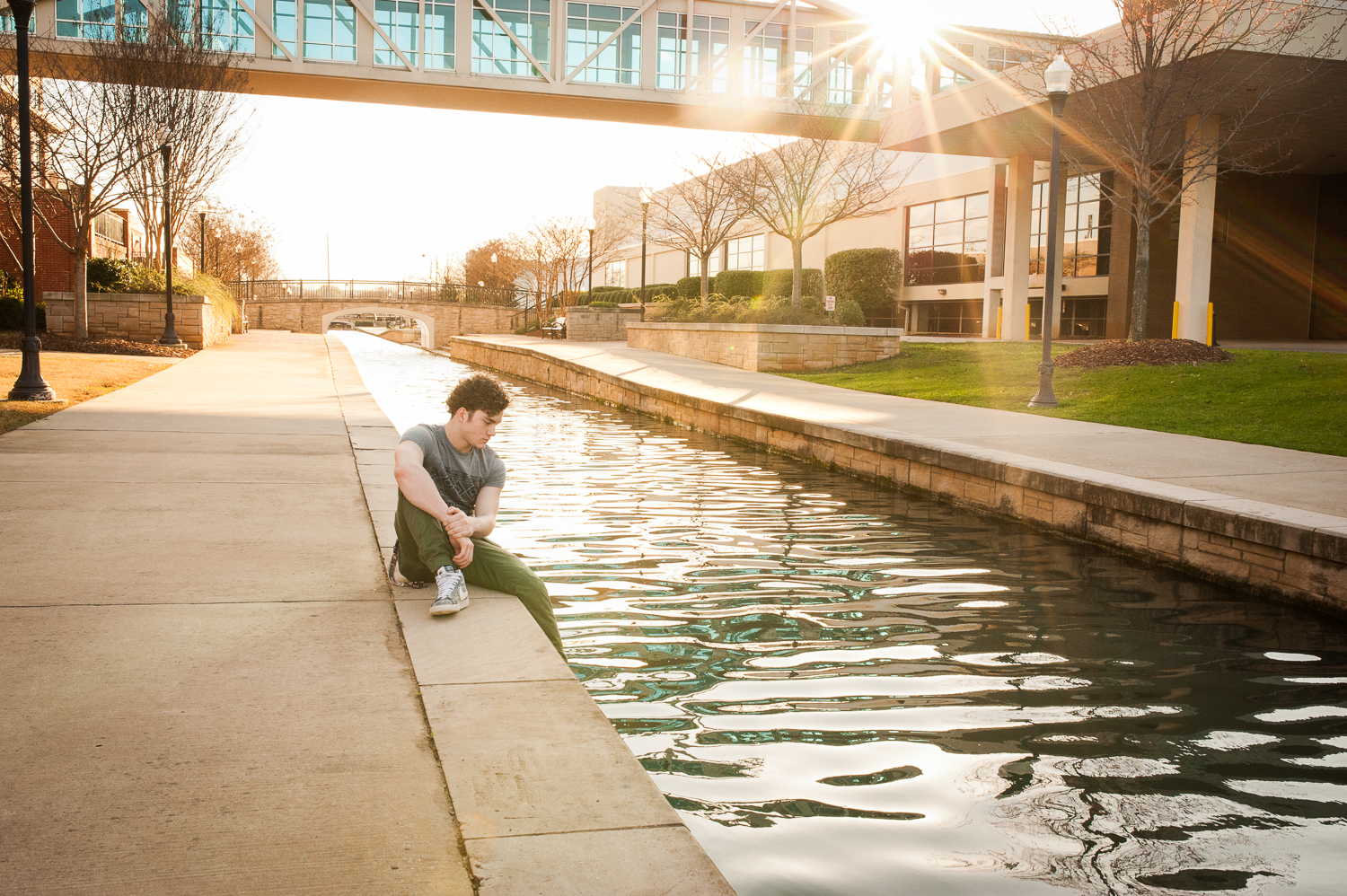 senior boy looking into water | Huntsville senior photographer