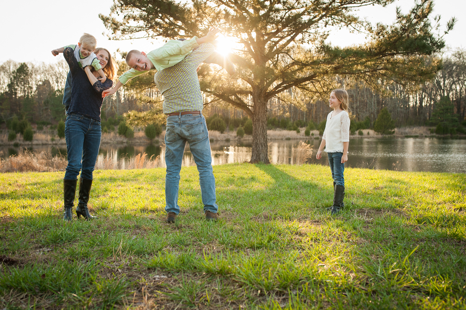 family of five playing in grass | Huntsville family photographer