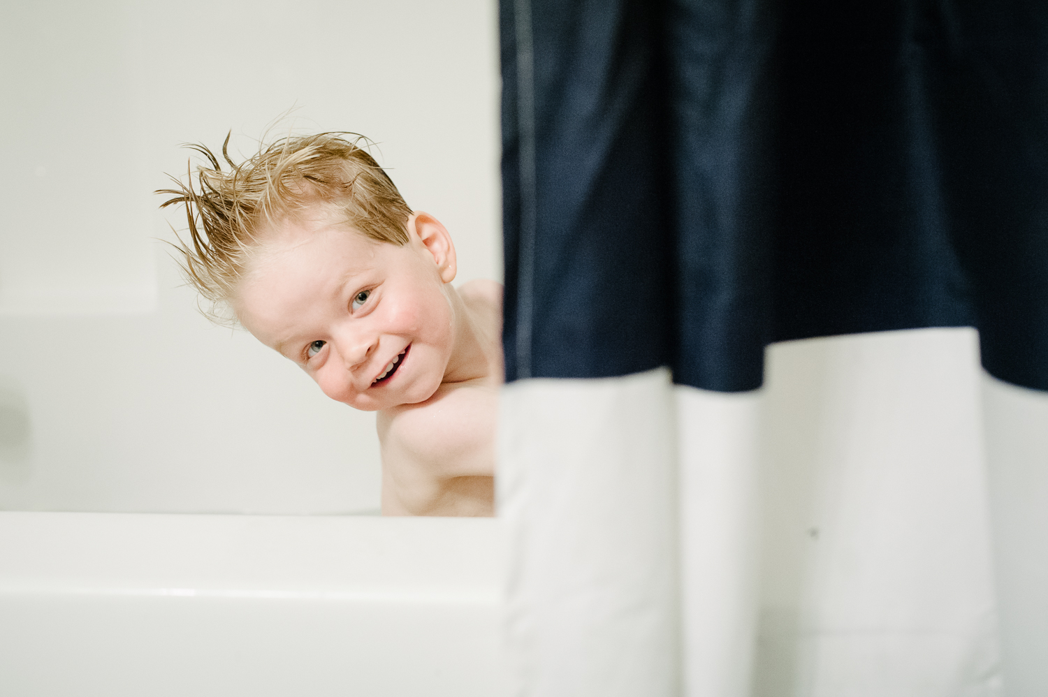 little boy playing in bathtub | Huntsville photographer