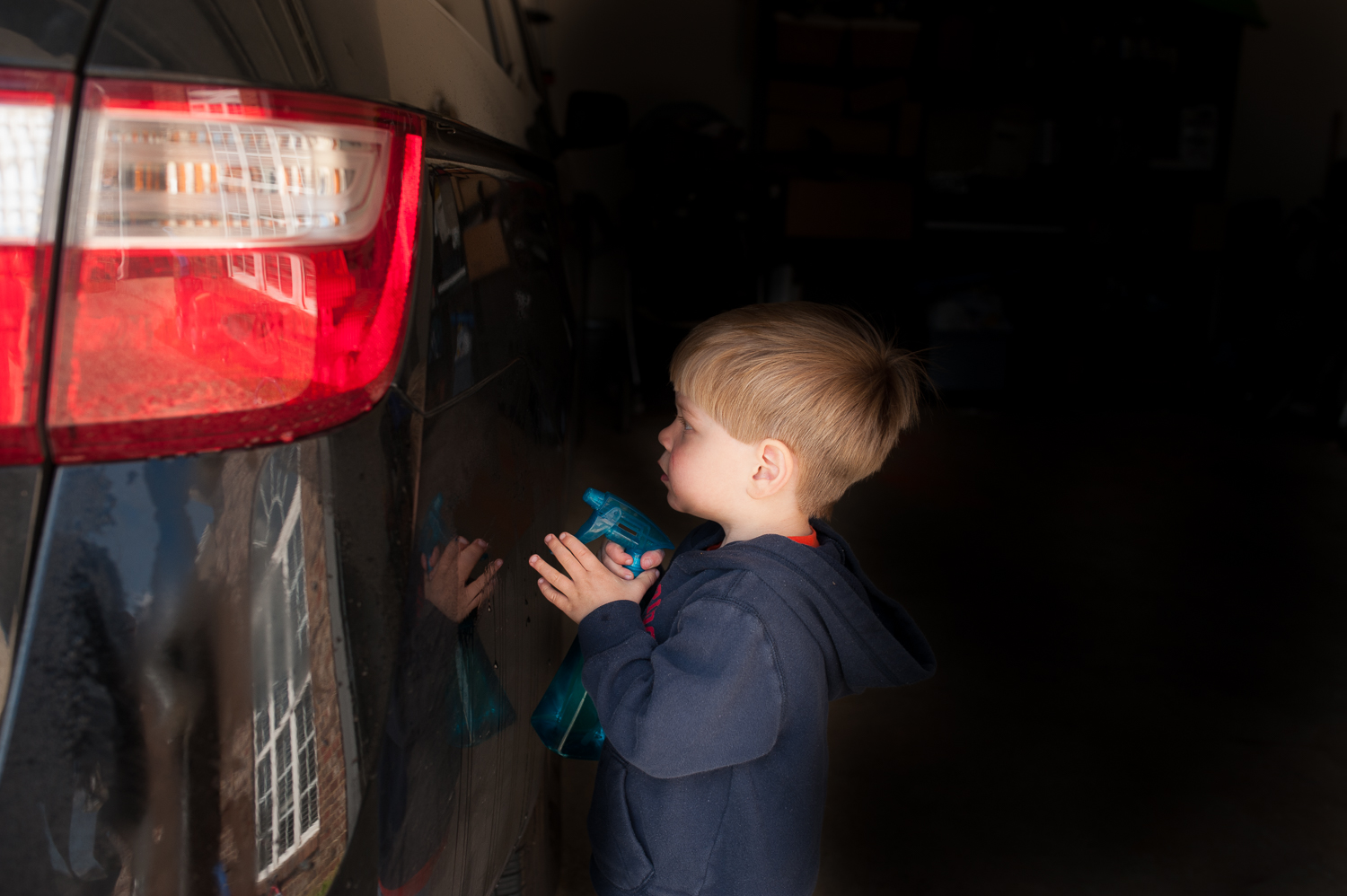 little boy spraying car | Huntsville photographer