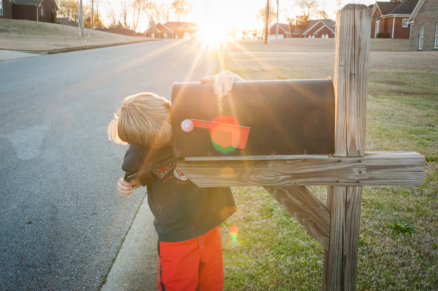 little boy checking mailbox | Huntsville photographer