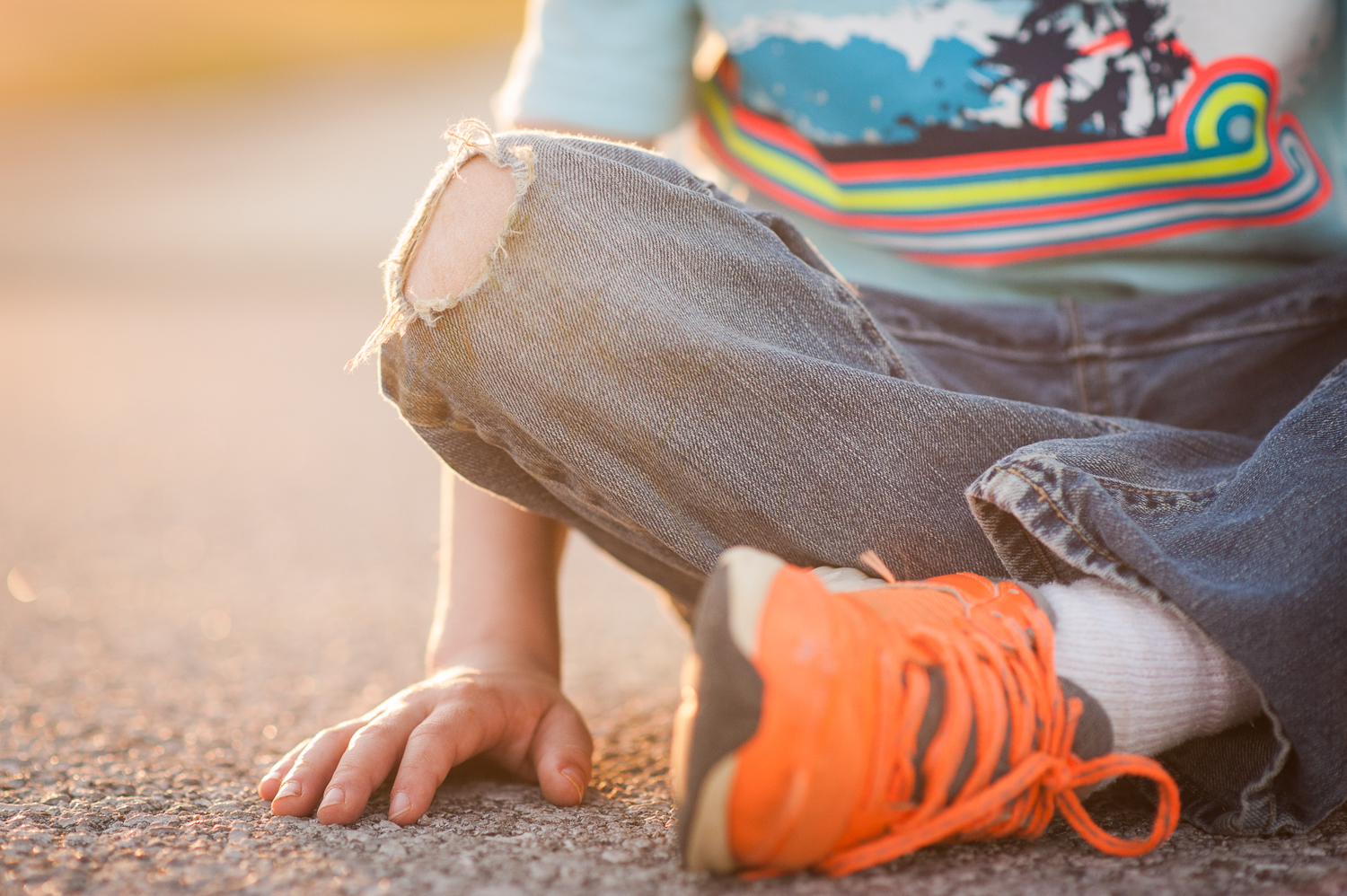 hole in little boy's jeans | Huntsville family photographer