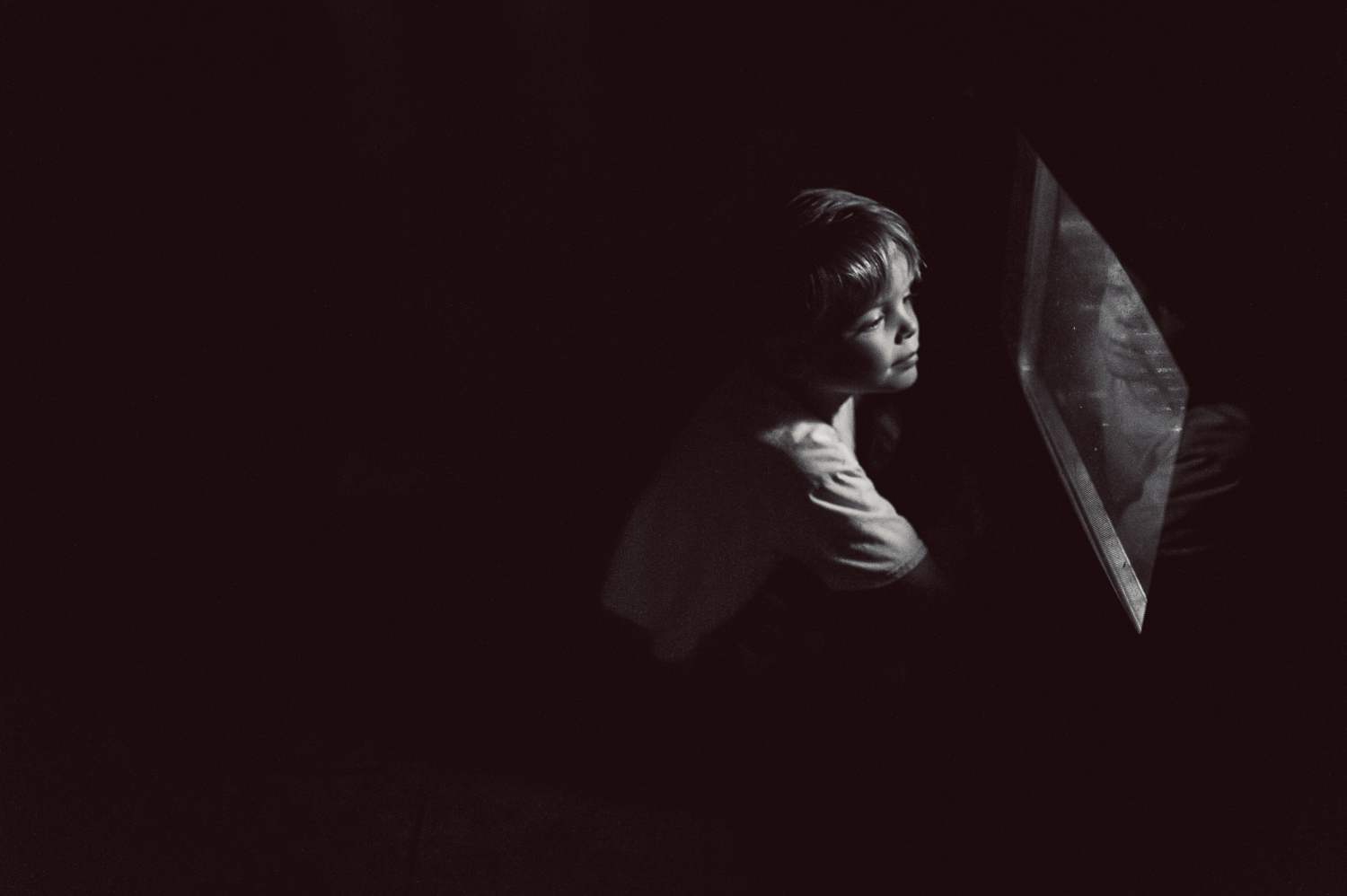 little boy sitting by oven light | Huntsville children's photographer