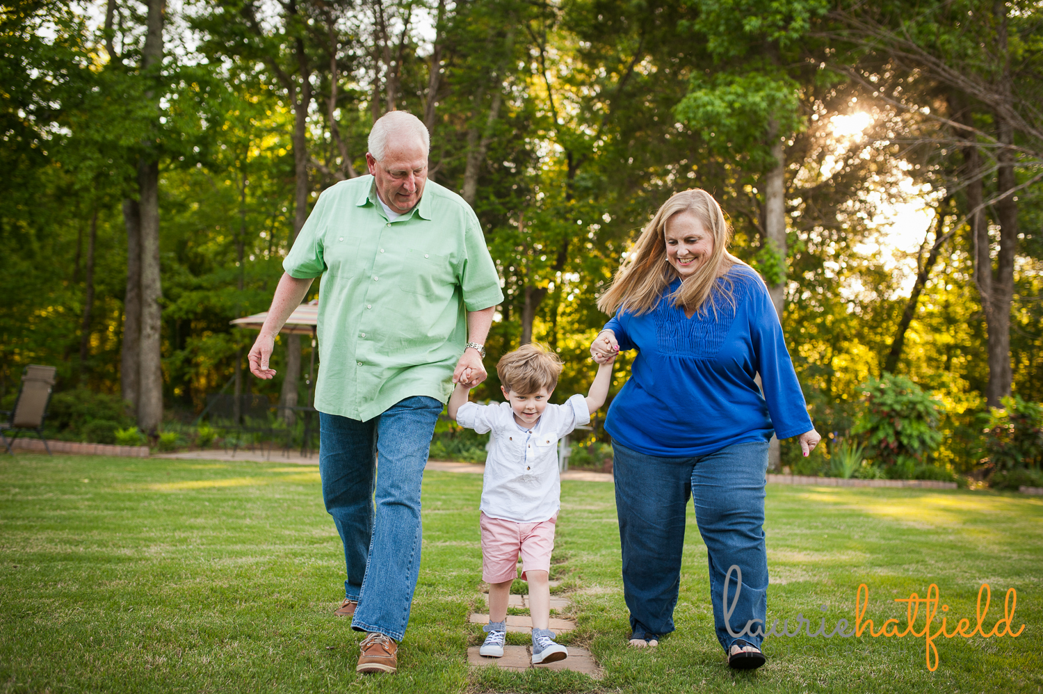 grandparents walking with grandson | Huntsville family photographer