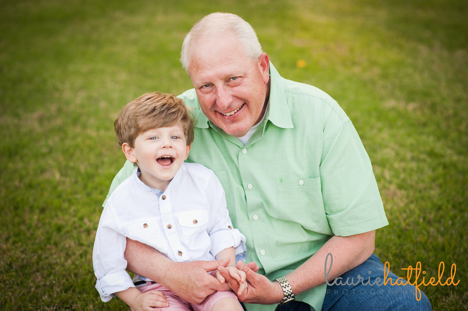 grandfather and 3-year-old grandson laughing | Huntsville photographer