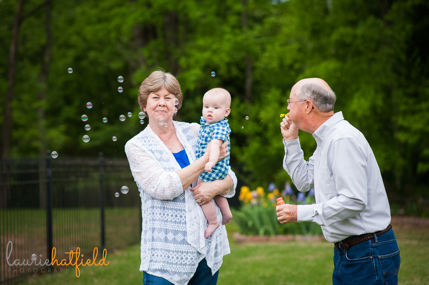 grandparents blowing bubbles with 3 grandsons | Huntsville family photographer