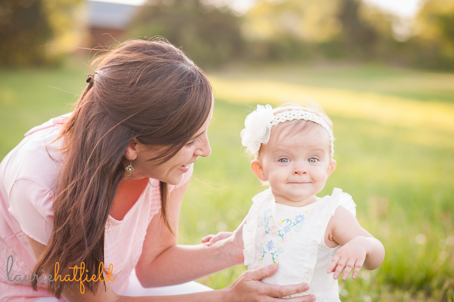 baby girl picking flowers | Huntsville photographer