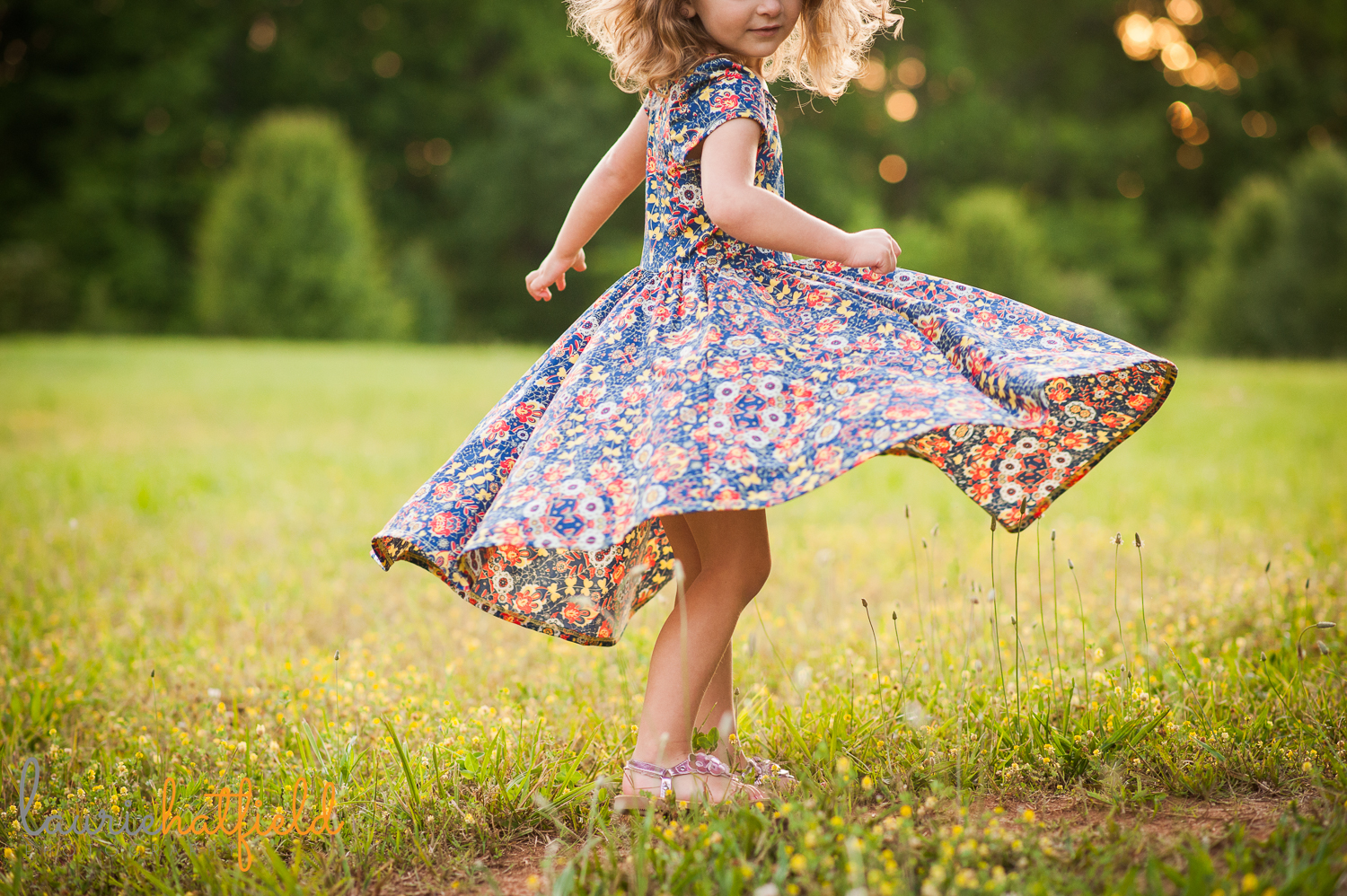 little girl in dress twirling | Huntsville family photographer