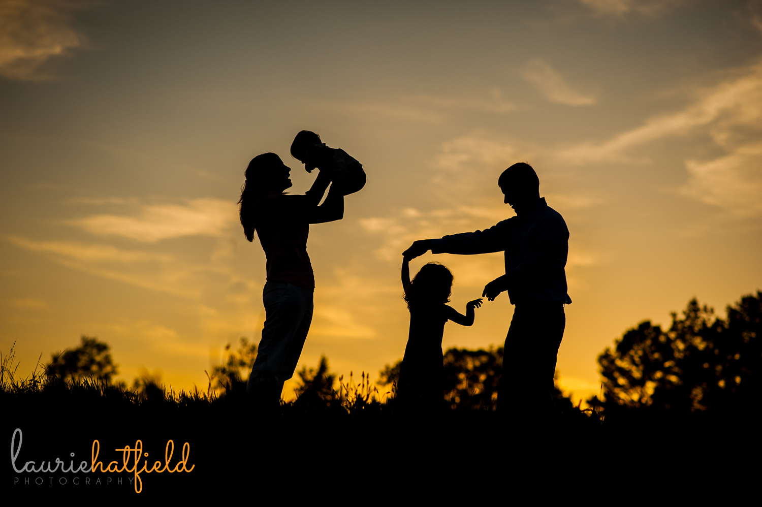 silhouette of family of four | Huntsville photographer