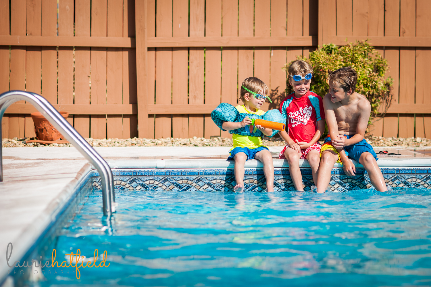 three brothers sitting around pool | Huntsville photographer