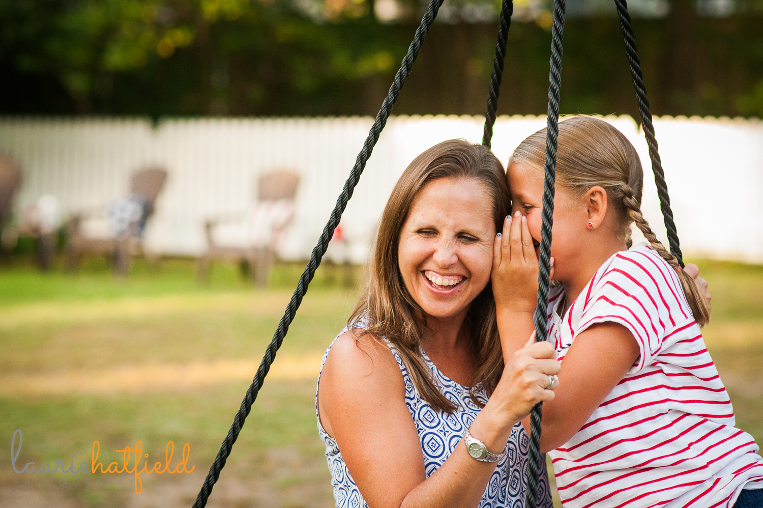 mom and daughter telling a secret | Huntsville family photographer