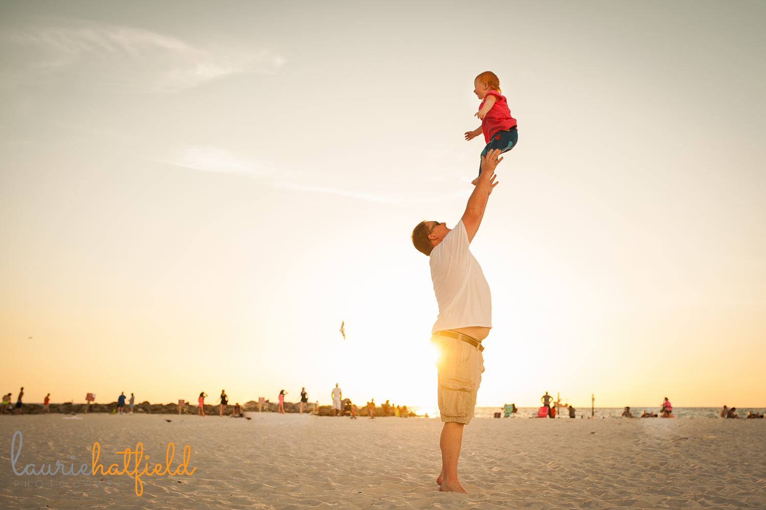 dad and 2-year-old daughter on beach | Huntsville photographer