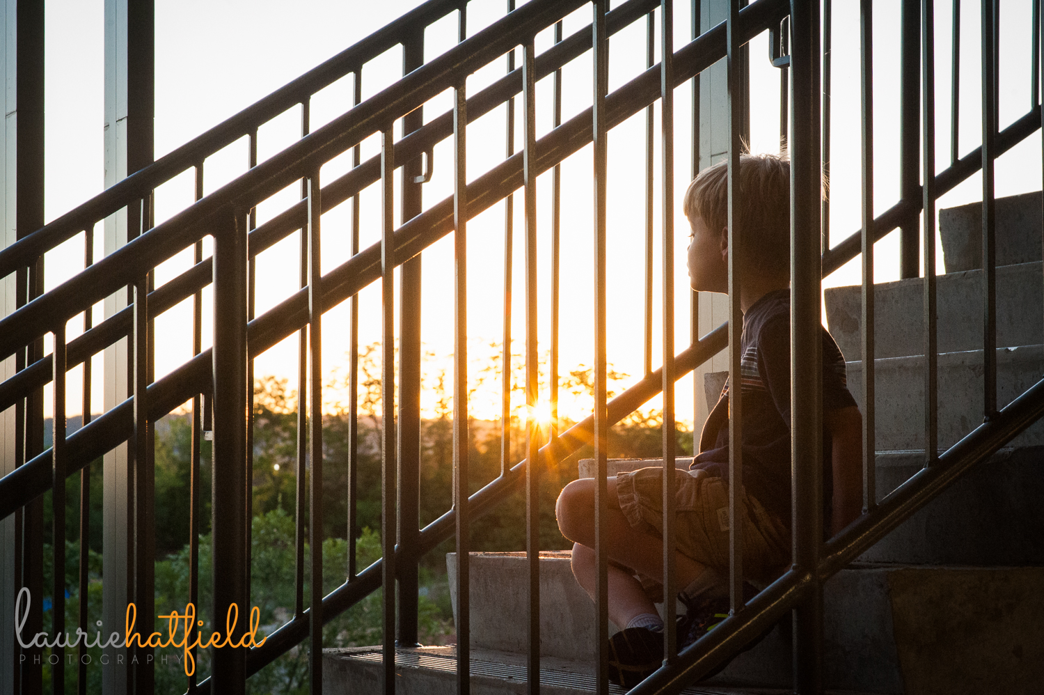 little boy on staircase at sunset | Huntsville family photographer