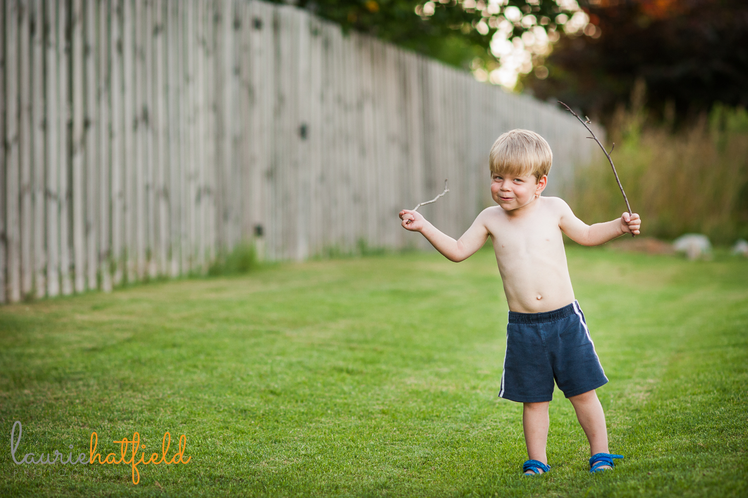 little boy with a stick | Huntsville family photographer