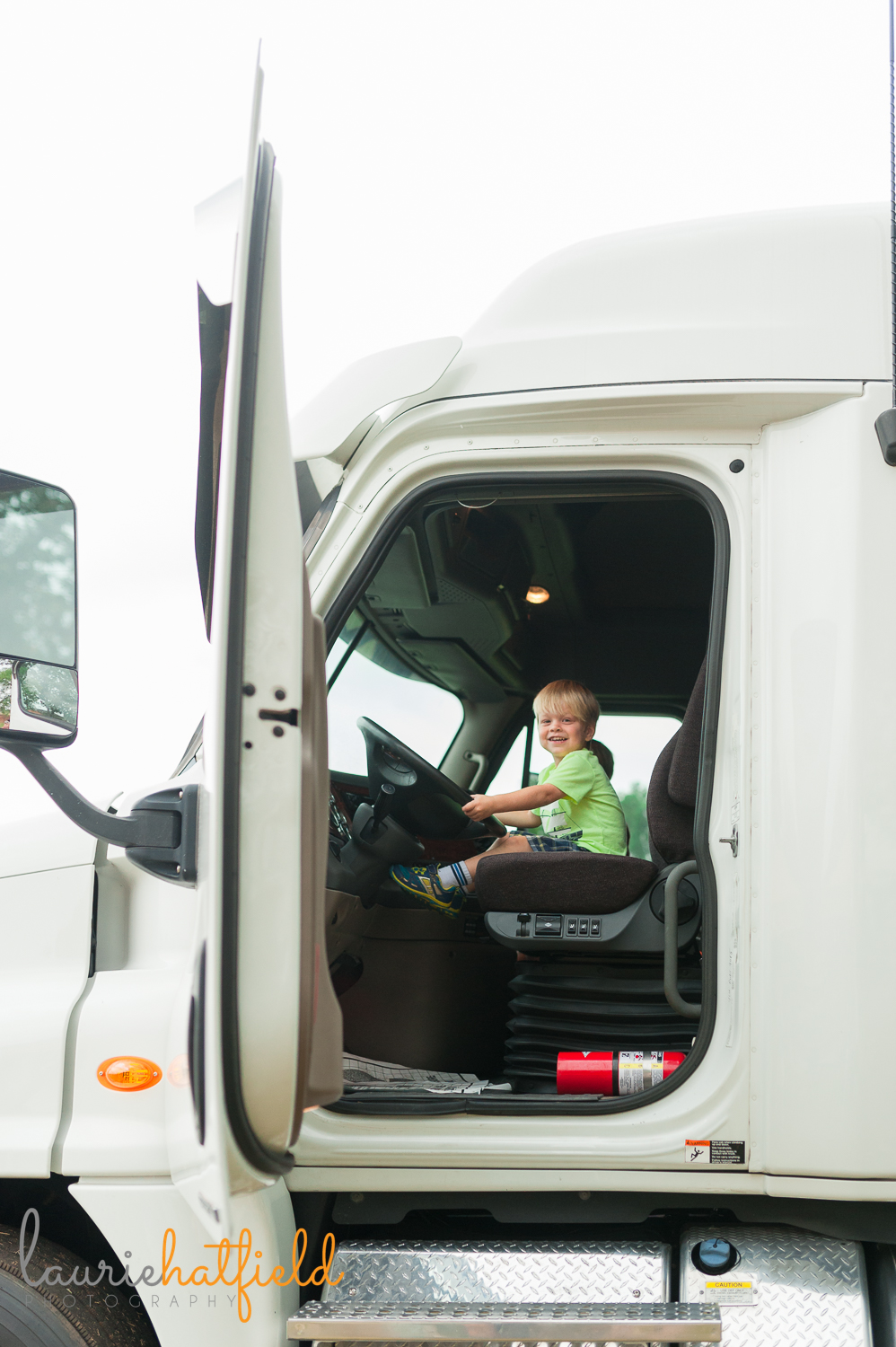 3-year-old in cab of truck | Huntsville child photographer